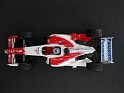 1:43 Minichamps Toyota TF104 2004 Red W/White Stripes. Uploaded by indexqwest